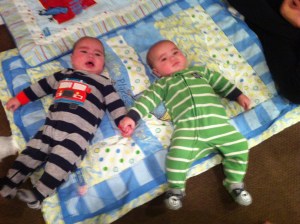 Scotty (left) holding hands with his brother, Logan, in March 2014.